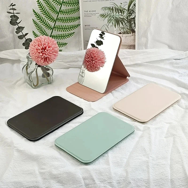 Woman MINI Folding Makeup Mirror High-quality Portable Pocket Makeup Mirror Single-side Creative Women Solid Color Handle Desk